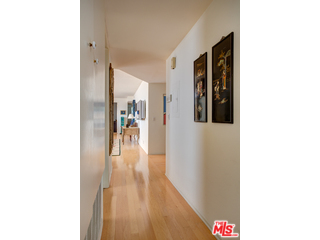 241 South Reeves Drive, Unit 302 Beverly Hills, CA 90212 - Photo 3 of 10 a picture of a room with wooden floor