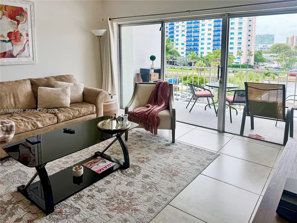 a spacious bathroom with a sink and a mirror