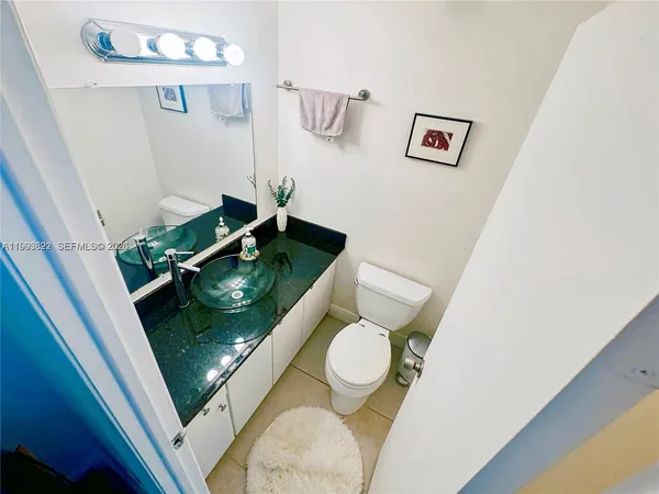 a bathroom with a toilet and a sink