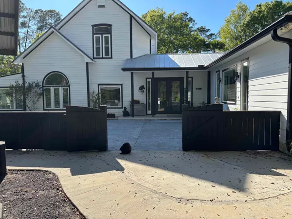 a view of a swimming pool with a patio