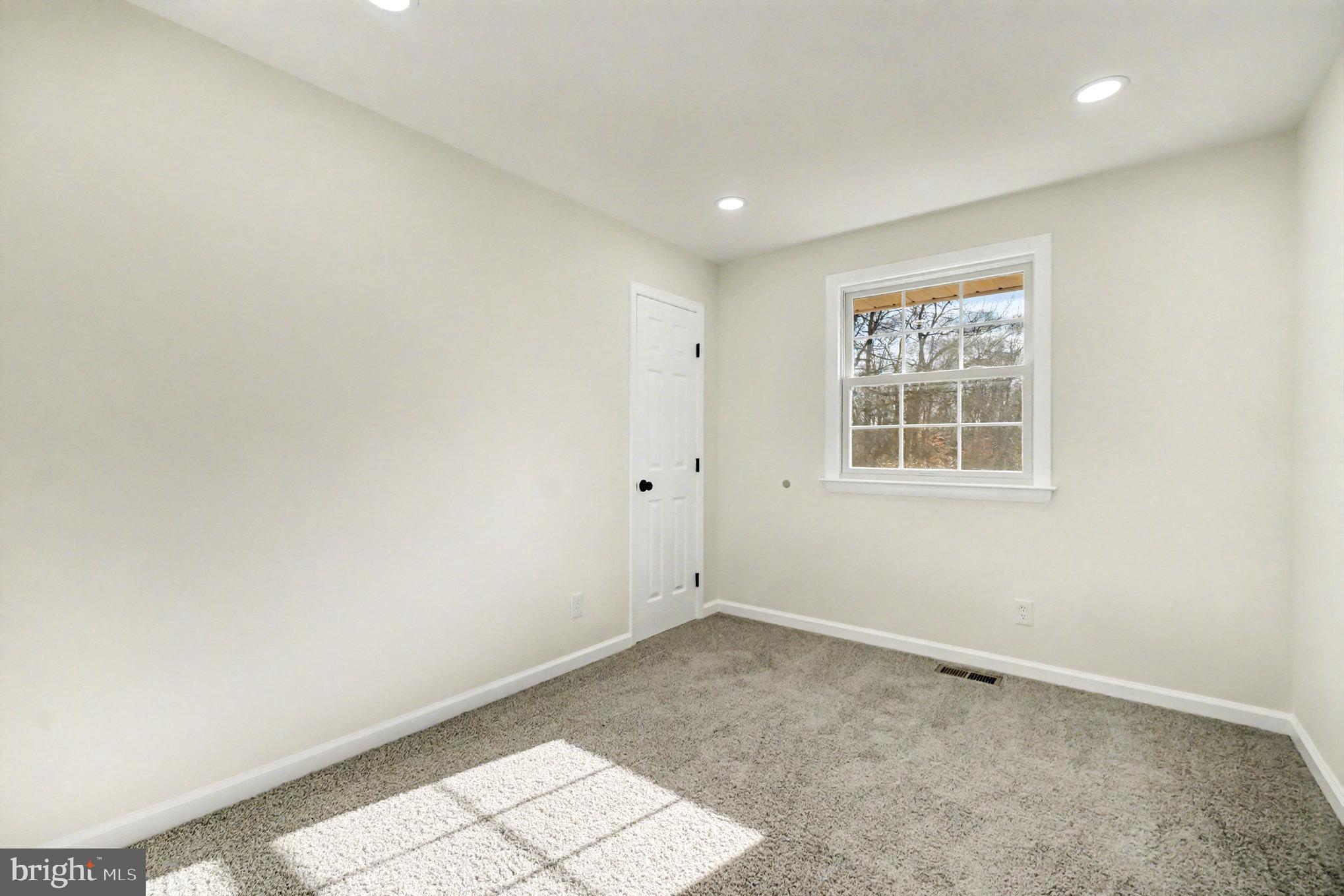 661 Pilot Town Road Conowingo, MD 21918 - Photo 14 of 38 an empty room with windows