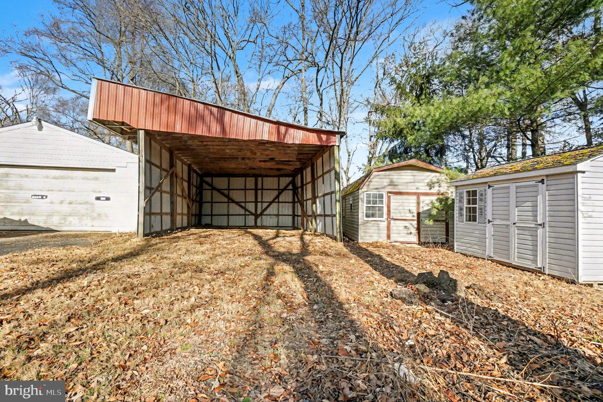 661 Pilot Town Road Conowingo, MD 21918 - Photo 32 of 38 a front view of a house with a yard and garage