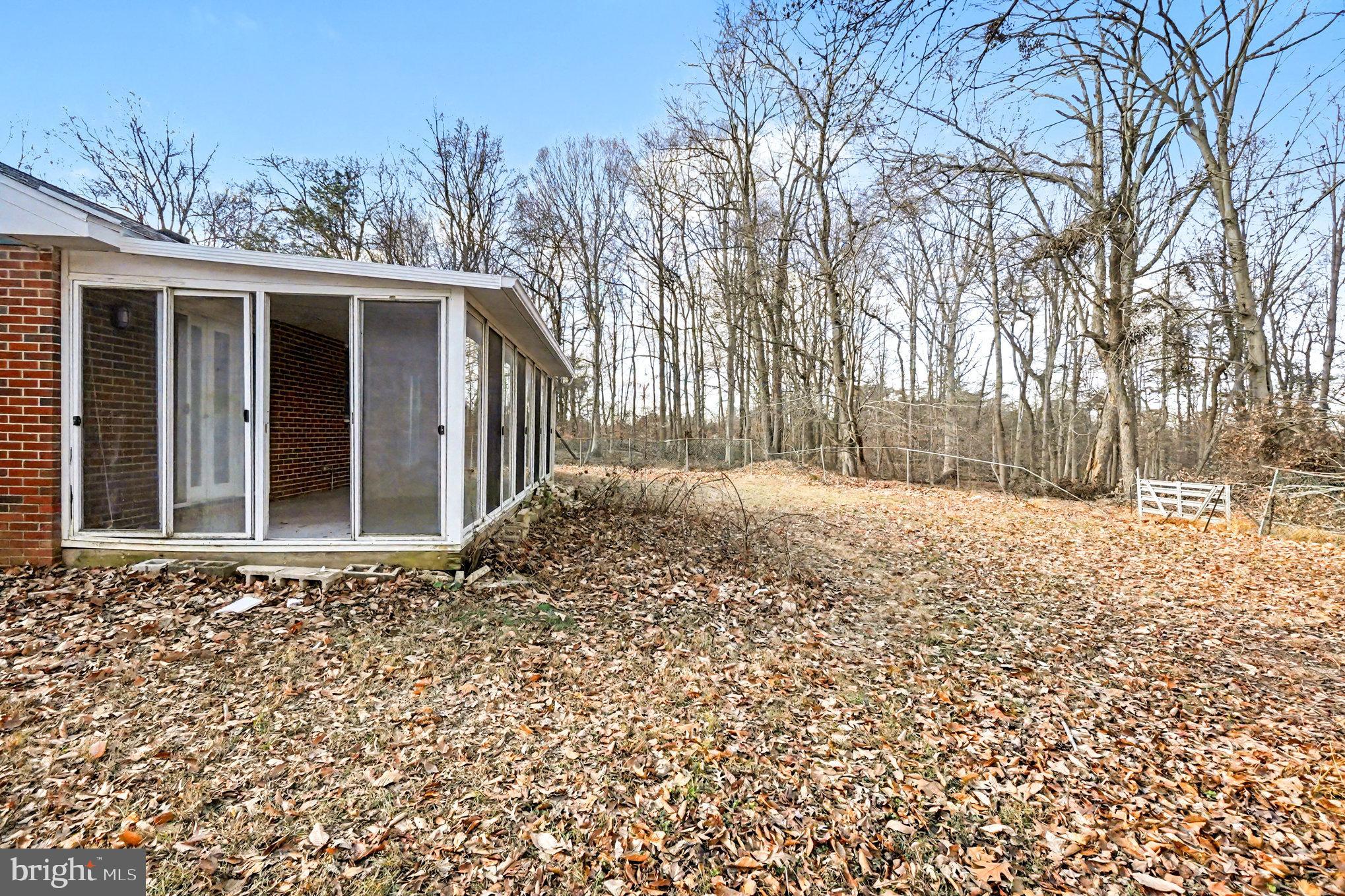 661 Pilot Town Road Conowingo, MD 21918 - Photo 35 of 38 a front view of a house with a yard covered with snow