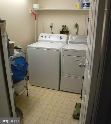 2903 Fallstaff Road, Unit 408 Baltimore, MD 21209 - Photo 8 of 8 a utility room with dryer and washer
