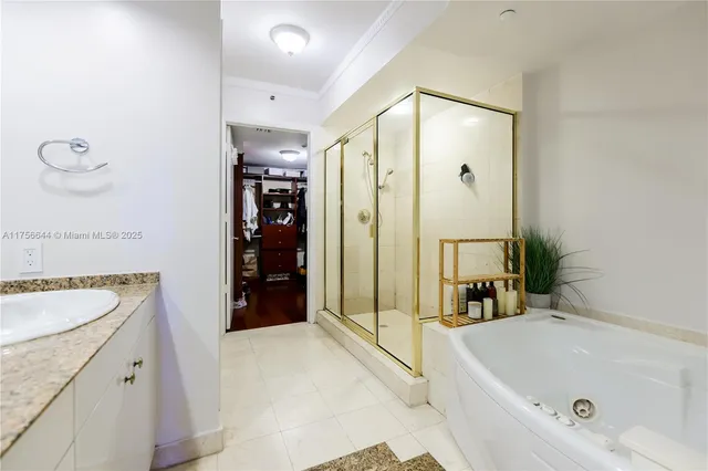a bathroom with a bathtub and a sink