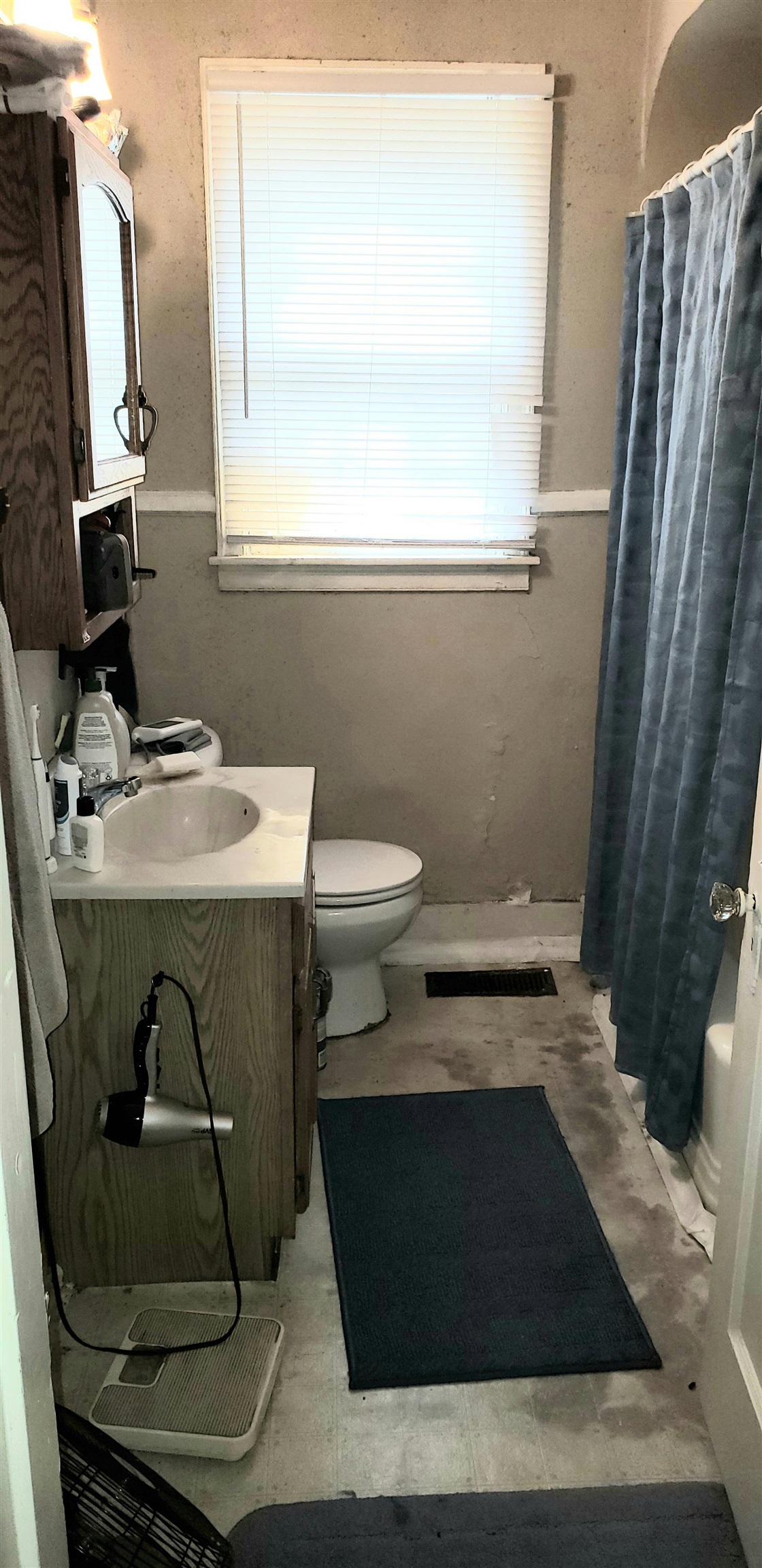 3388 Carrington Road Memphis, TN 38111 - Photo 16 of 23 a bathroom with a sink and a mirror