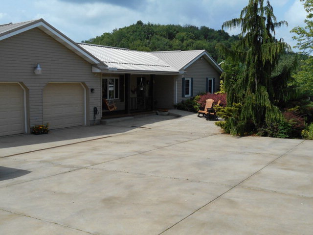 19 Sporer Lane Marble, PA 16334 - Photo 1 of 1 front view of a house with a patio