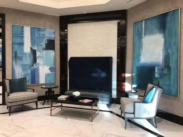 a view of a golf course with a lake