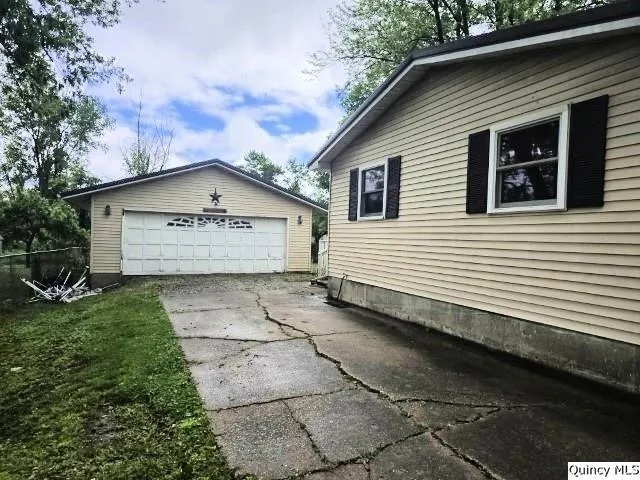 a front view of a house with yard