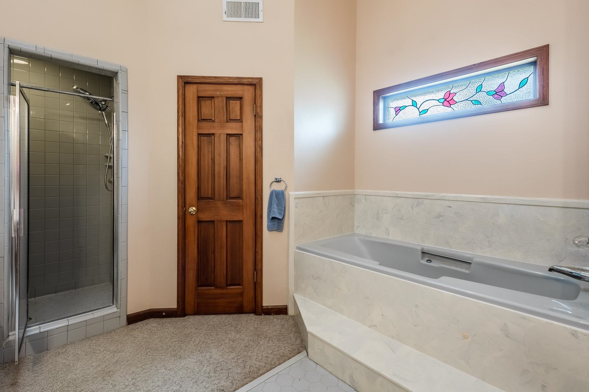 8670 Deadfall Road Millington, TN 38053 - Photo 13 of 25 a bathroom with a bathtub