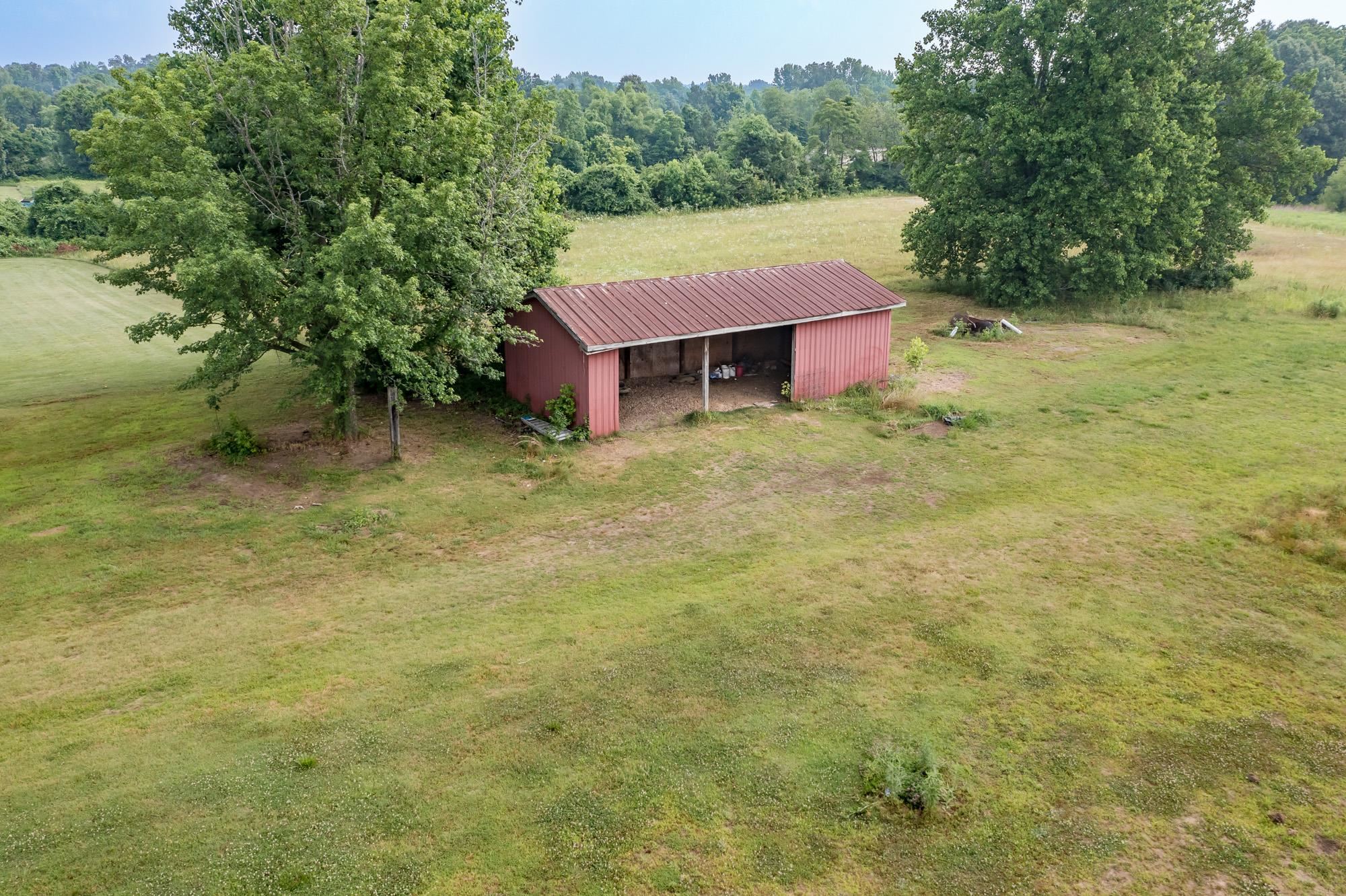 8670 Deadfall Road Millington, TN 38053 - Photo 23 of 25 a view of a big yard with an outdoor space