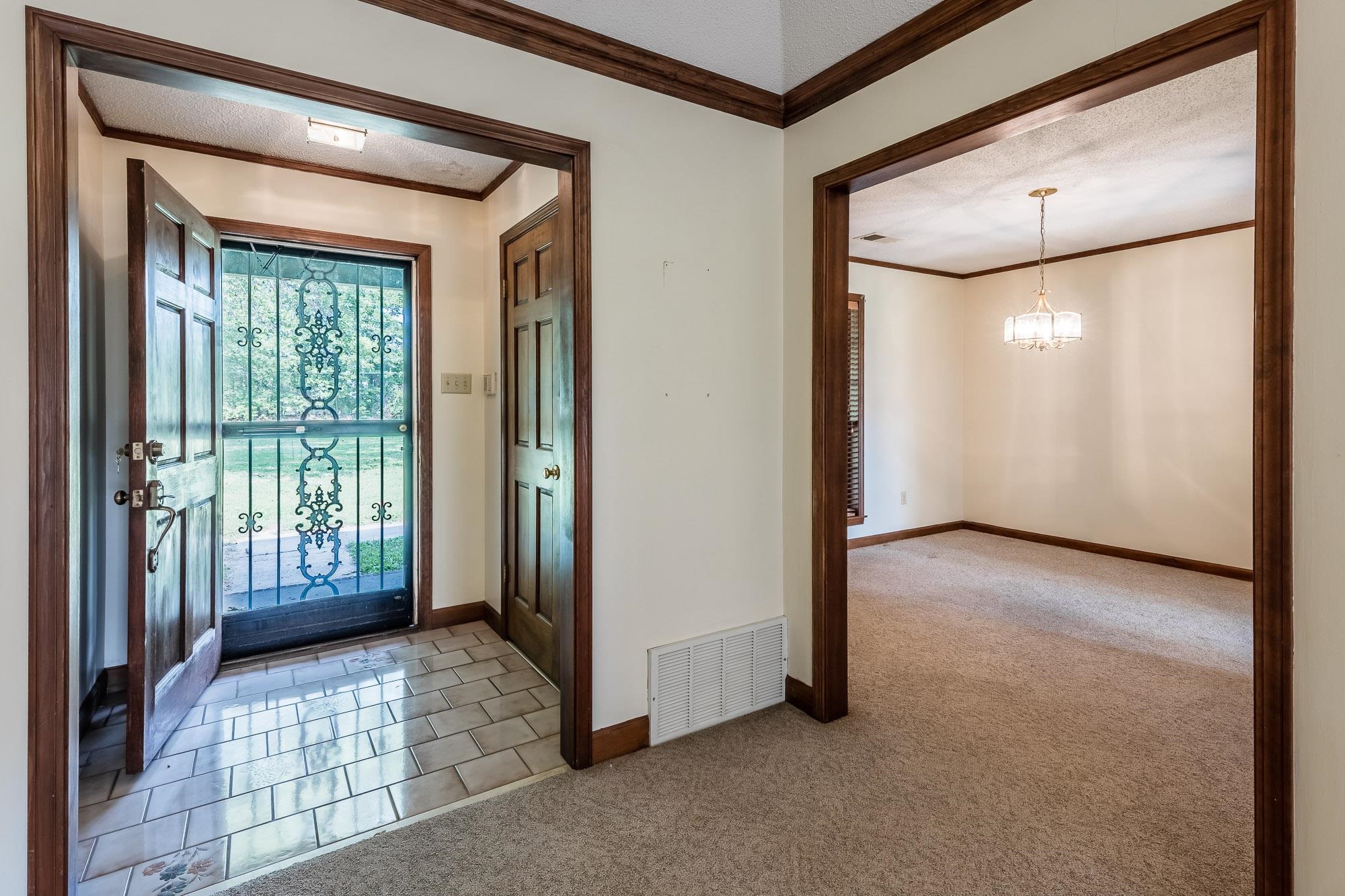 8670 Deadfall Road Millington, TN 38053 - Photo 3 of 25 a view of a large room with windows and closet