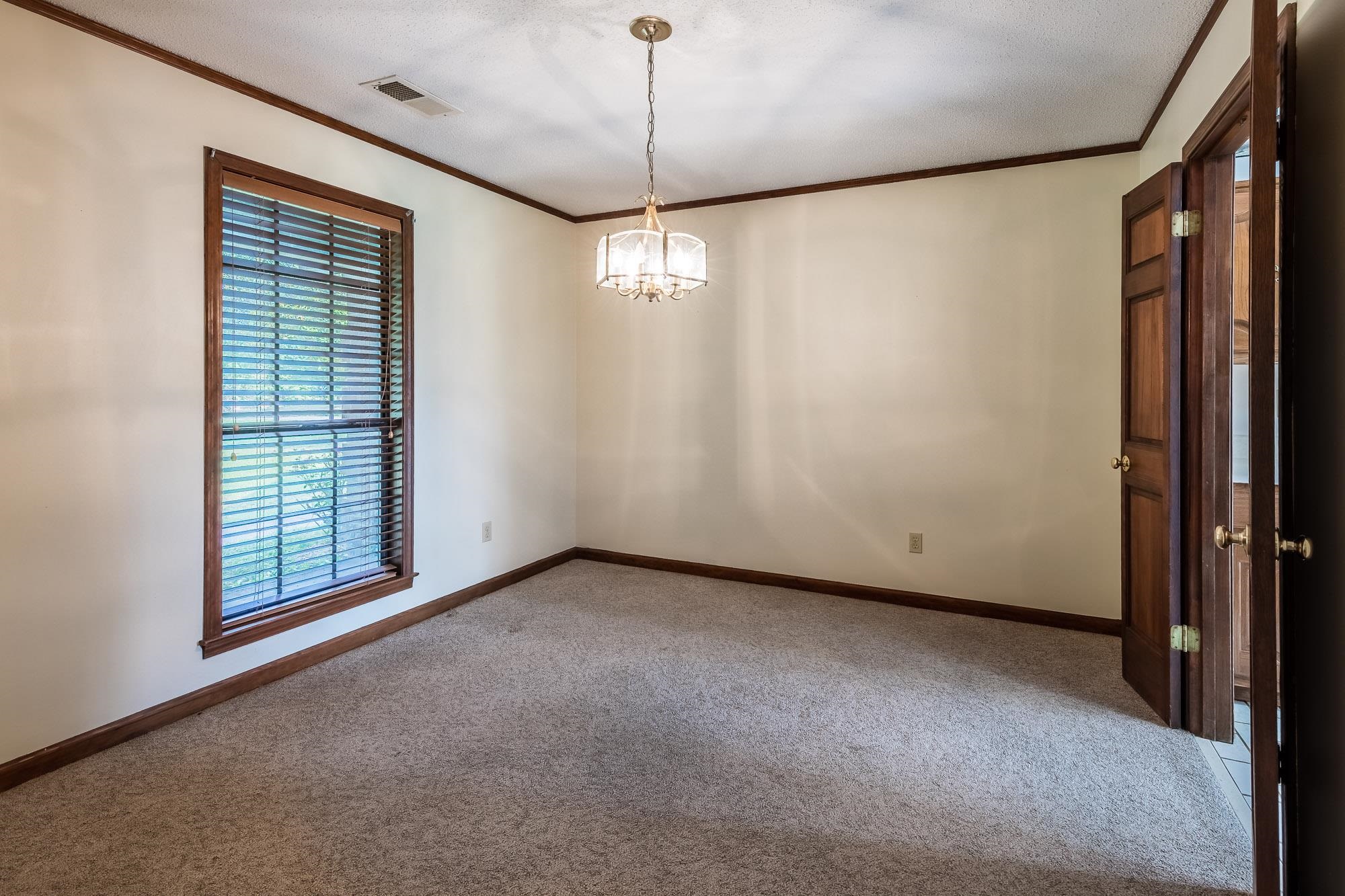 8670 Deadfall Road Millington, TN 38053 - Photo 4 of 25 a view of an empty room with a window