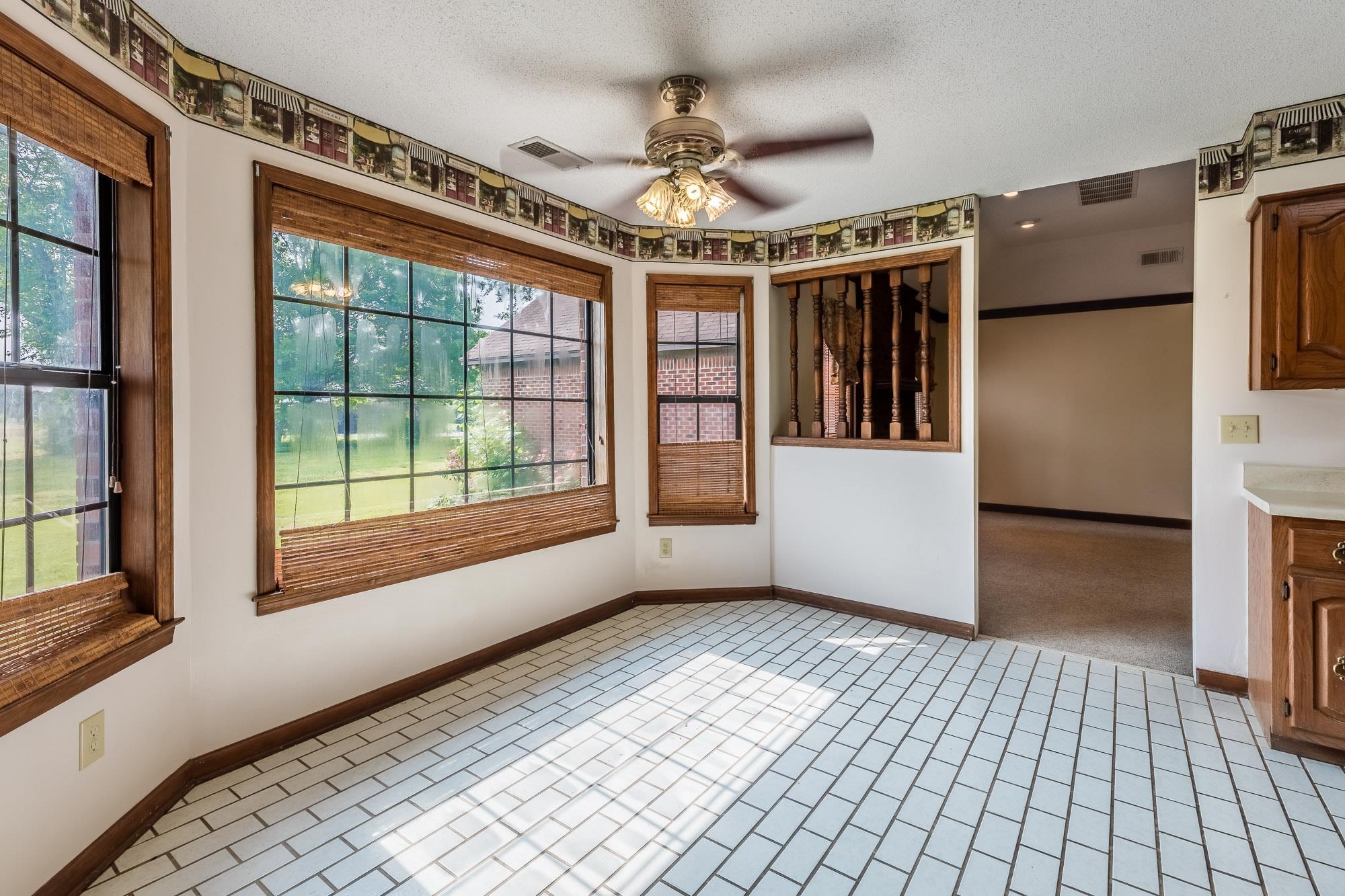 8670 Deadfall Road Millington, TN 38053 - Photo 8 of 25 a view of entryway with stairs and wooden floor