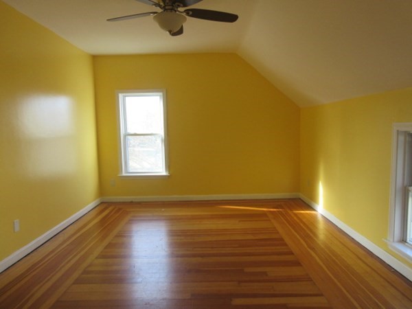 166 Knight Street Woonsocket, RI 02895 - Photo 13 of 22 a view of empty room with wooden floor