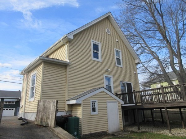 166 Knight Street Woonsocket, RI 02895 - Photo 18 of 22 a view of a house with a yard