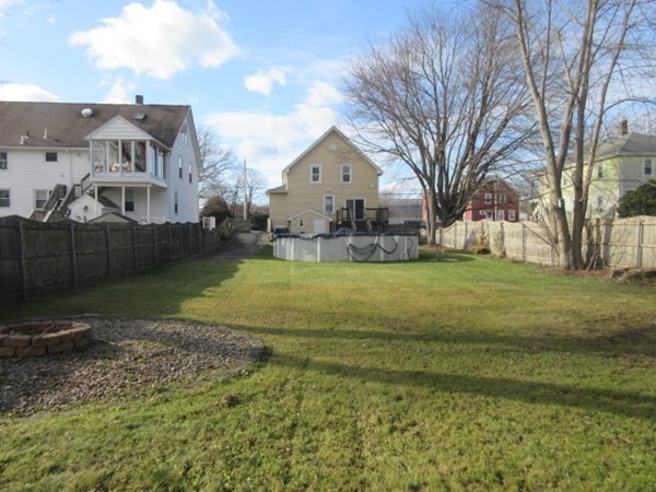 166 Knight Street Woonsocket, RI 02895 - Photo 20 of 22 a view of a house with a yard