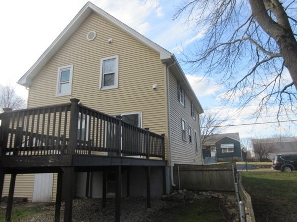 166 Knight Street Woonsocket, RI 02895 - Photo 22 of 22 a view of a house with a yard