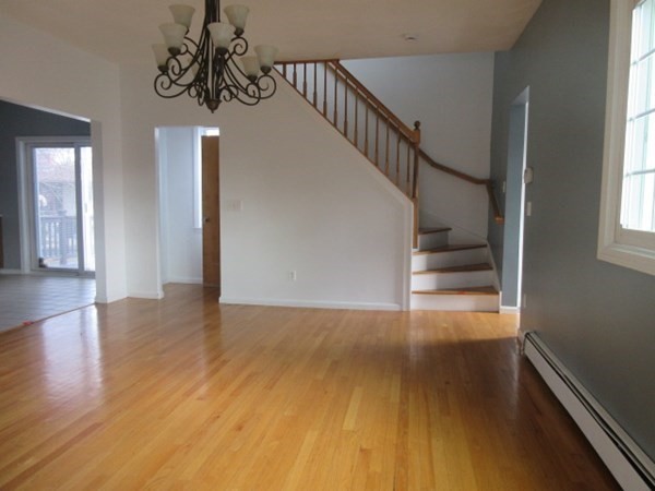 166 Knight Street Woonsocket, RI 02895 - Photo 4 of 22 a view of entryway and hall with wooden floor