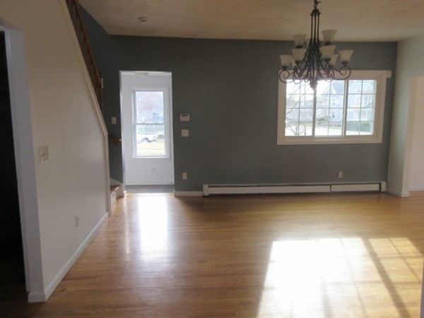 166 Knight Street Woonsocket, RI 02895 - Photo 8 of 22 a view of room with window and hardwood floor