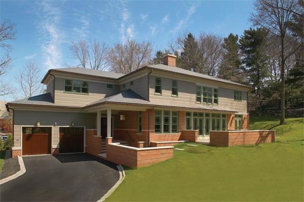 38 Hedge Road Brookline, MA 02445 - Photo 1 of 8 a view of a house with a yard balcony and sitting area