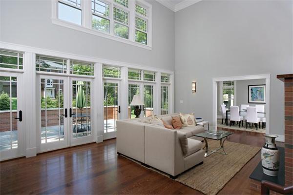 38 Hedge Road Brookline, MA 02445 - Photo 4 of 8 a living room with furniture and large windows
