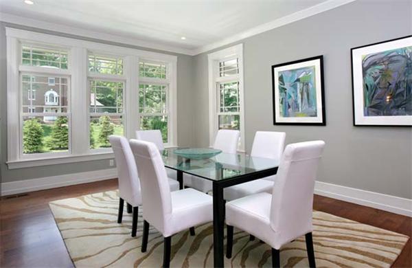 38 Hedge Road Brookline, MA 02445 - Photo 7 of 8 a view of a dining room with furniture a couch and wooden floor