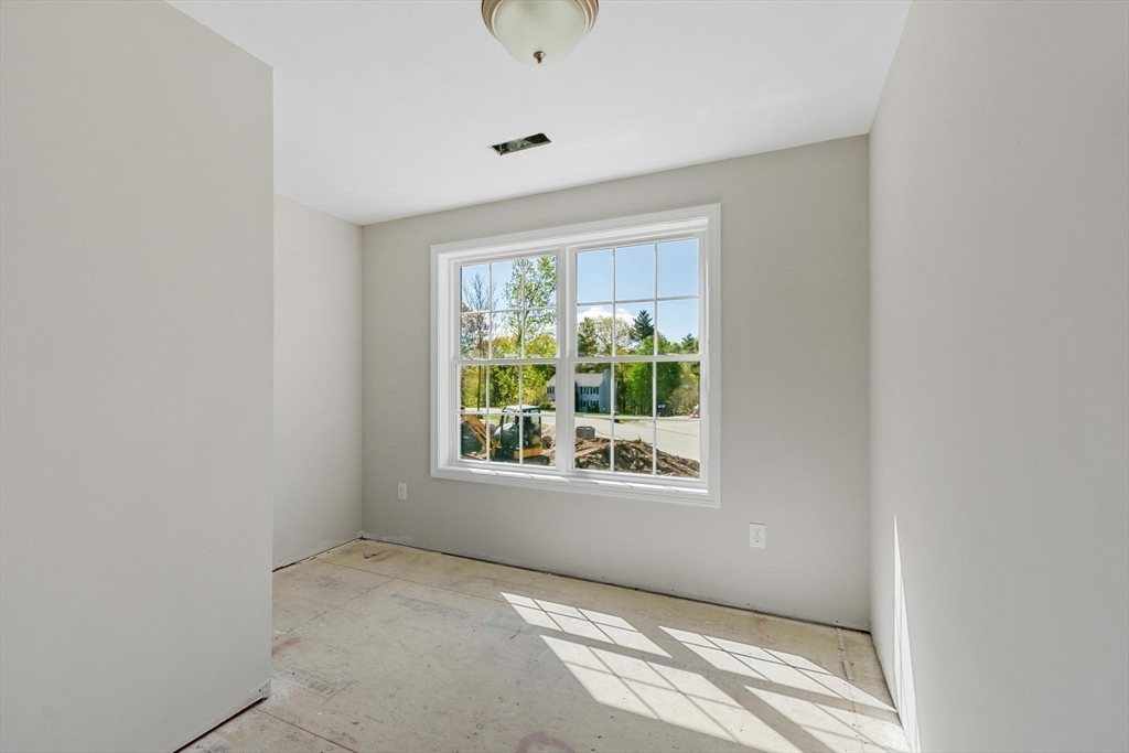 22 Benoit Avenue Pelham, NH 03076 - Photo 35 of 42 a view of an empty room with a window