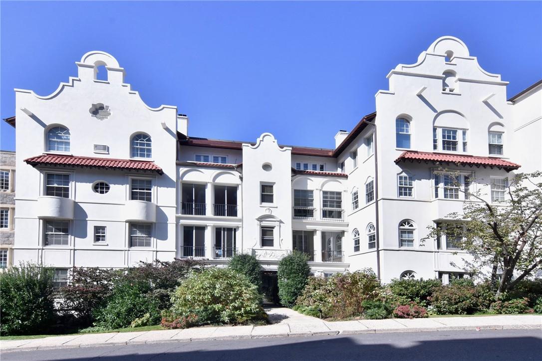 23 Sagamore Road, Unit 3E Bronxville, NY 10708 - Photo 1 of 1 a front view of a house with a yard