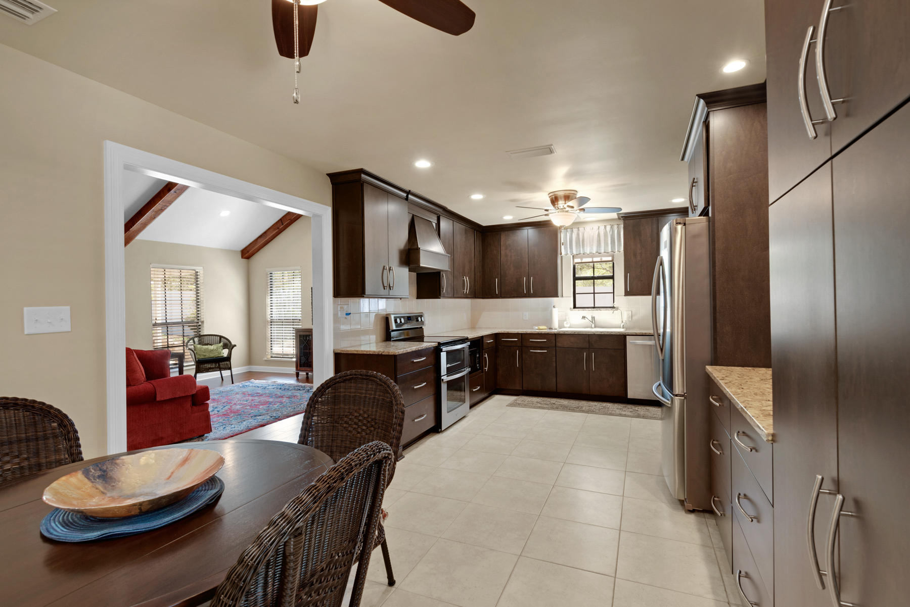 583 Ridge Road Santa Rosa Beach, FL 32459 - Photo 12 of 37 a large kitchen with a table and chairs