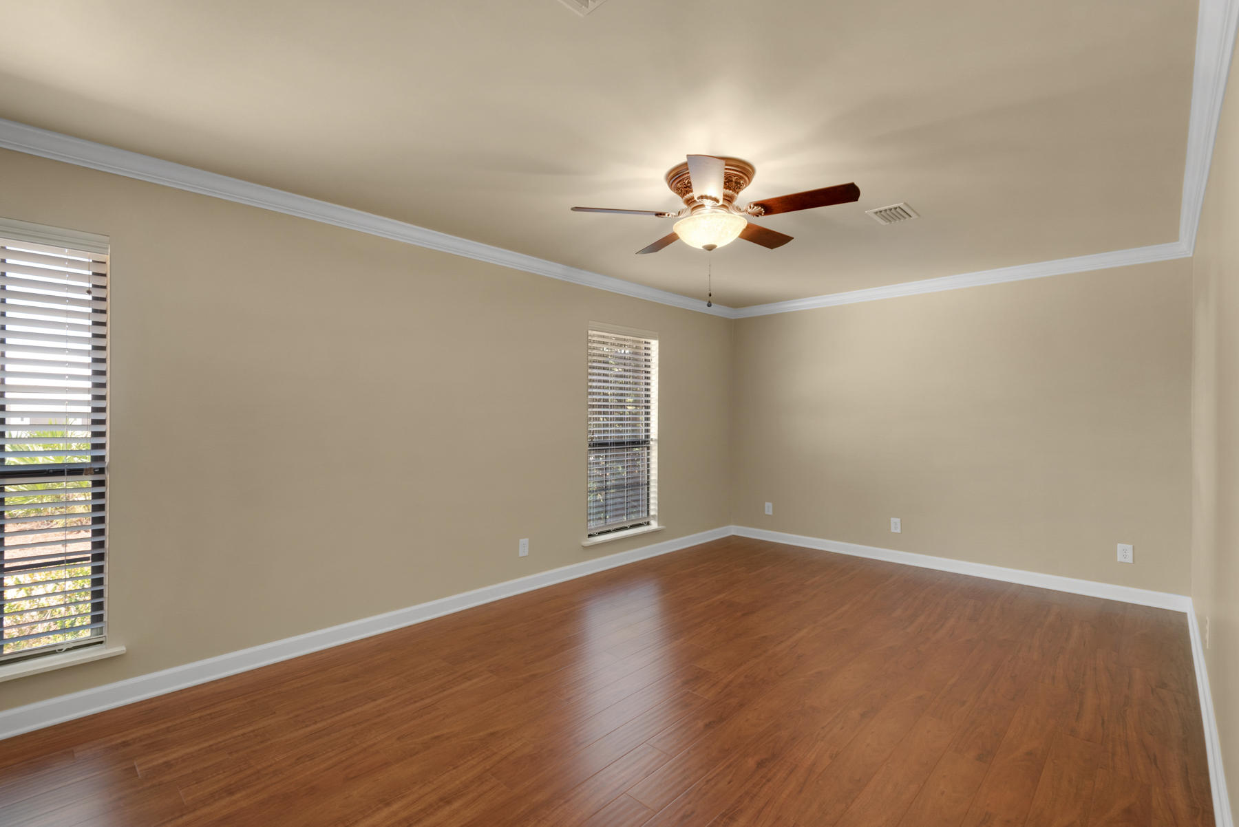 583 Ridge Road Santa Rosa Beach, FL 32459 - Photo 18 of 37 wooden floor in an empty room with a window