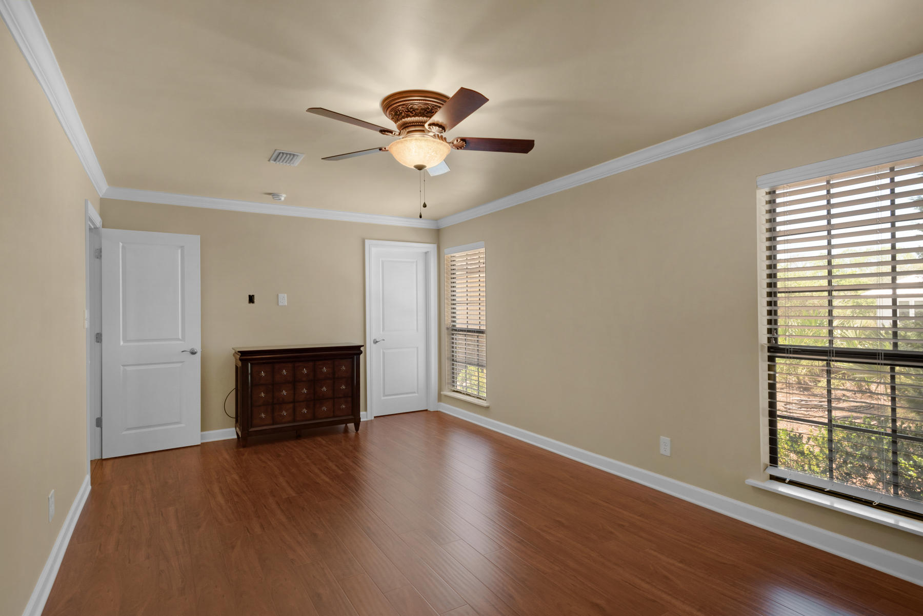 583 Ridge Road Santa Rosa Beach, FL 32459 - Photo 19 of 37 a view of an empty room with window and wooden floor