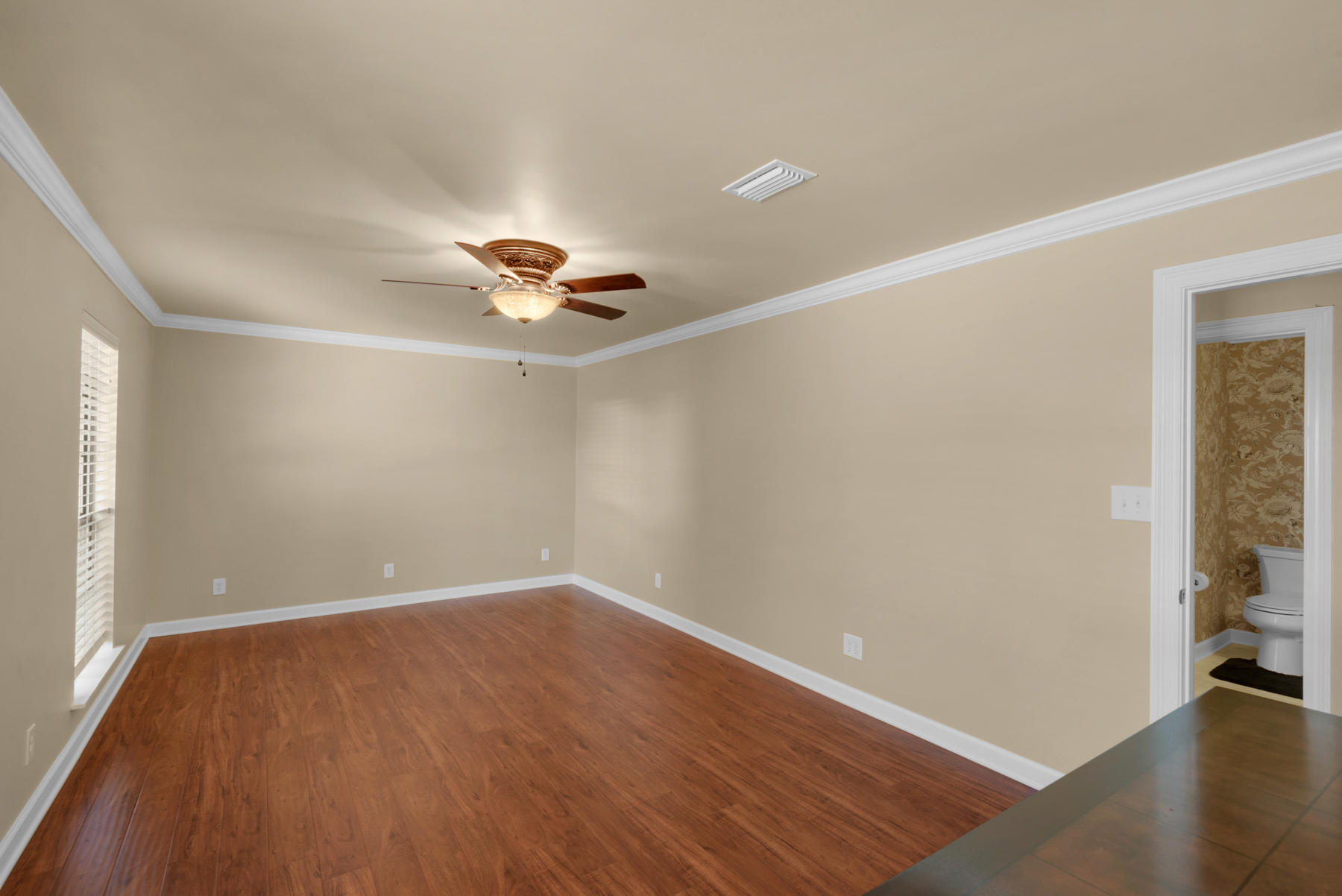 583 Ridge Road Santa Rosa Beach, FL 32459 - Photo 20 of 37 wooden floor in an empty room with a window
