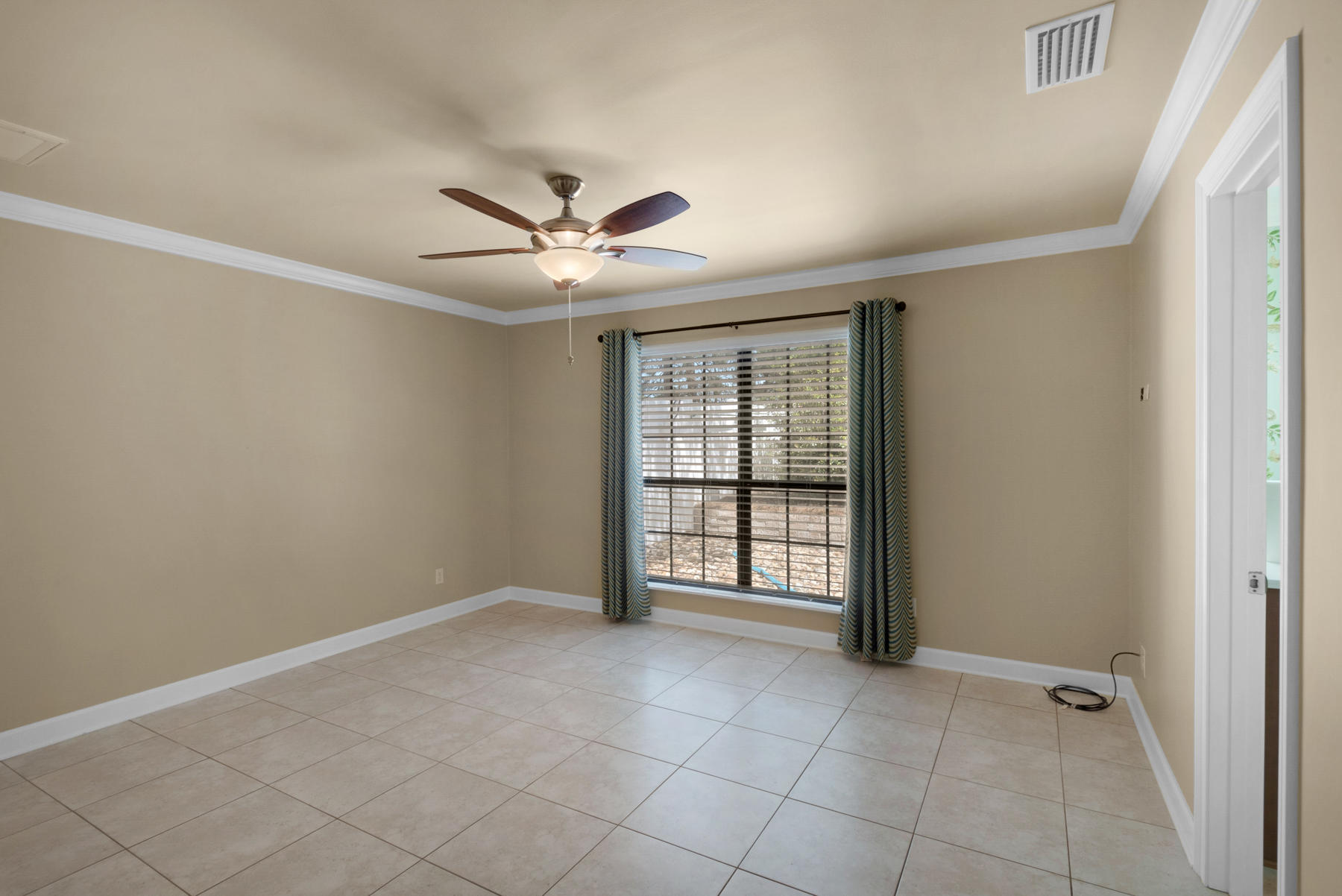 583 Ridge Road Santa Rosa Beach, FL 32459 - Photo 22 of 37 a view of an empty room with a window