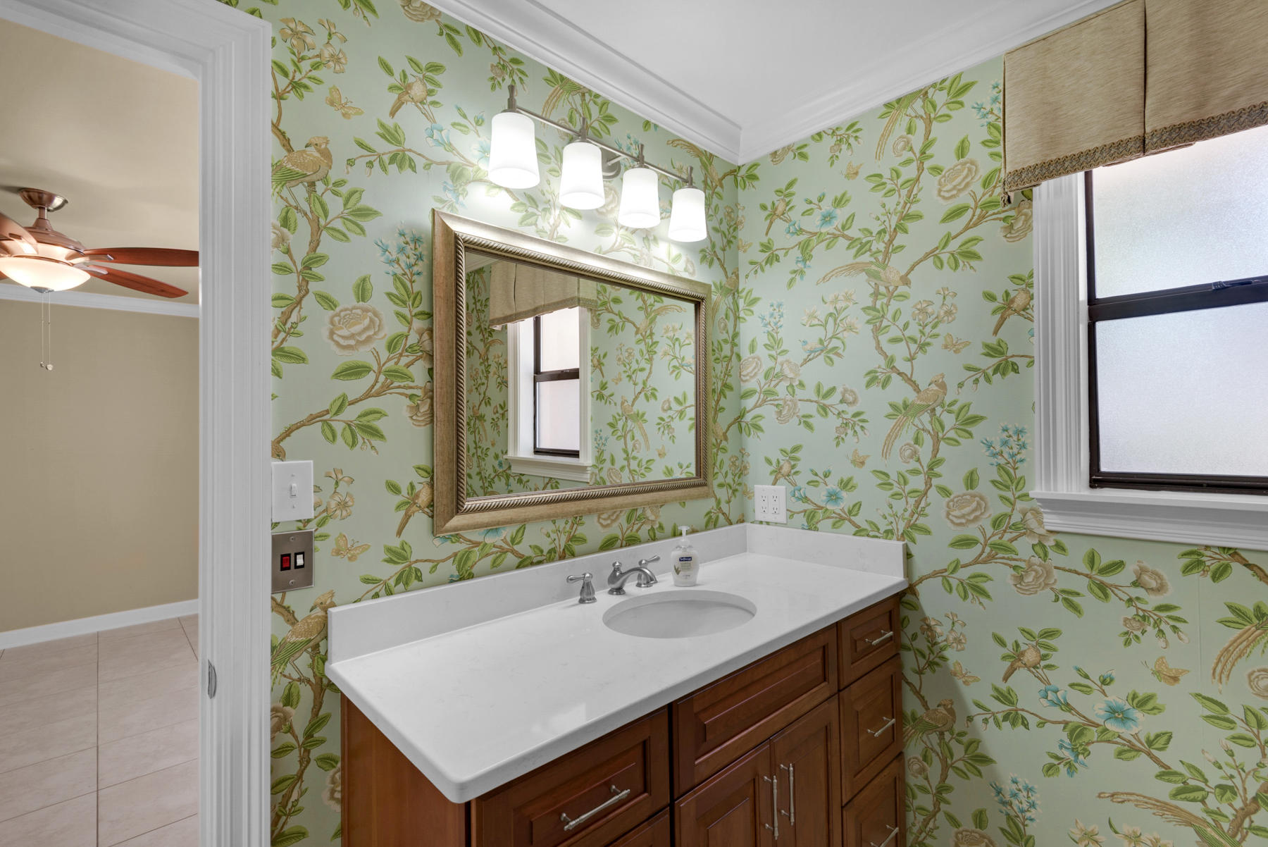 583 Ridge Road Santa Rosa Beach, FL 32459 - Photo 27 of 37 a bathroom with a sink and a mirror