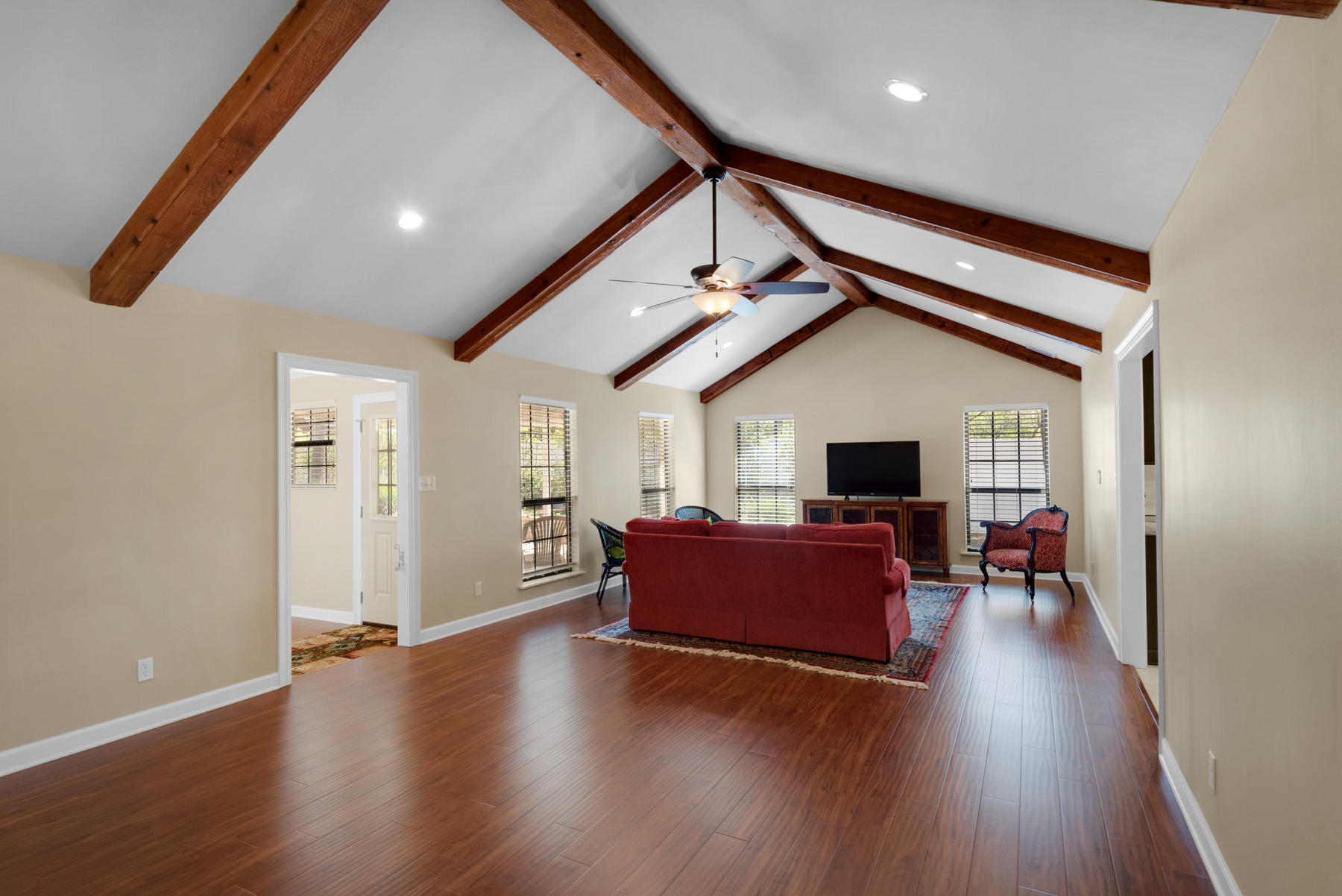 583 Ridge Road Santa Rosa Beach, FL 32459 - Photo 5 of 37 a living room with furniture and a wooden floor