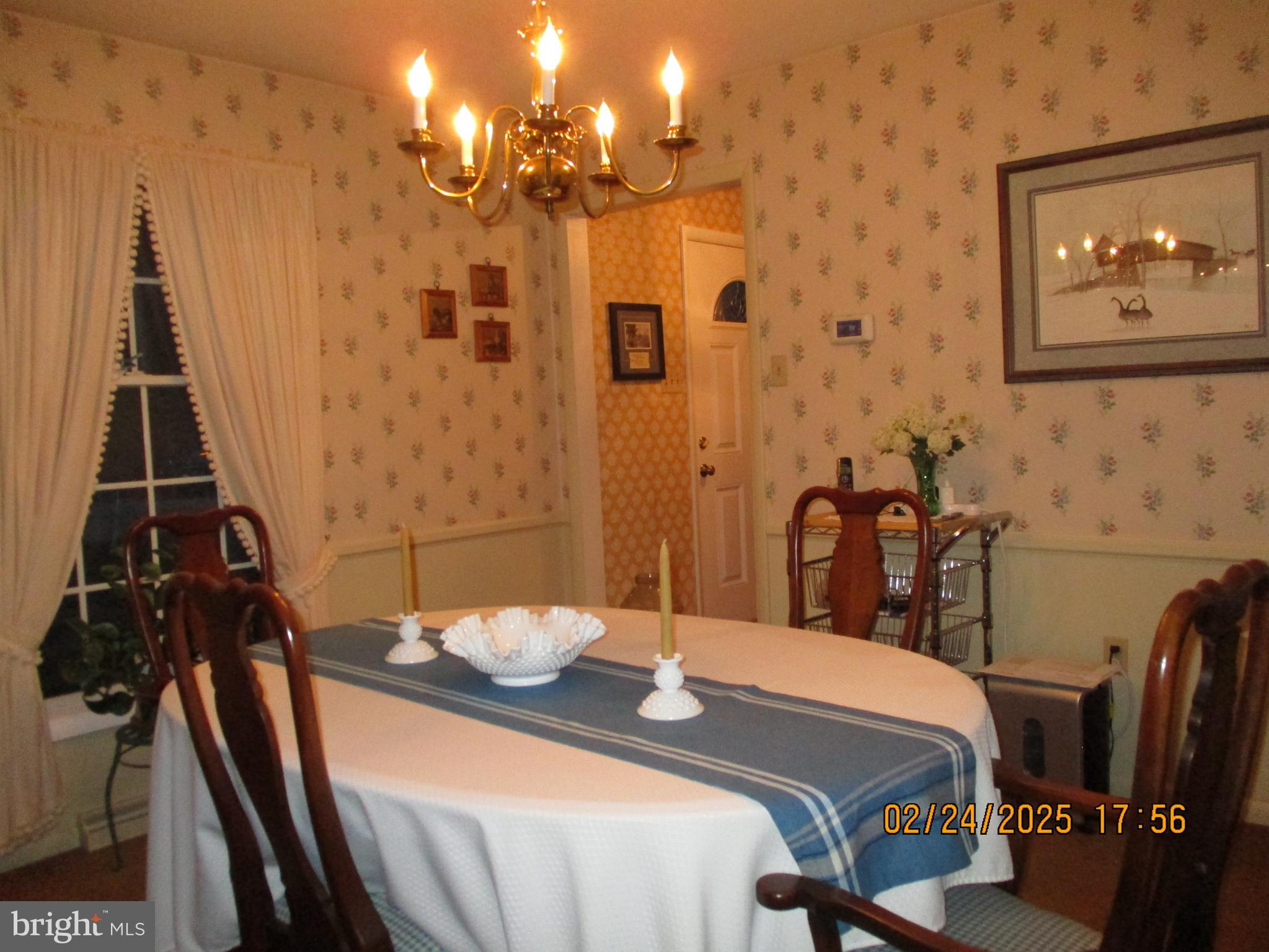 116 Lexington Road York, PA 17402 - Photo 14 of 69 a bedroom with a bed and a chandelier