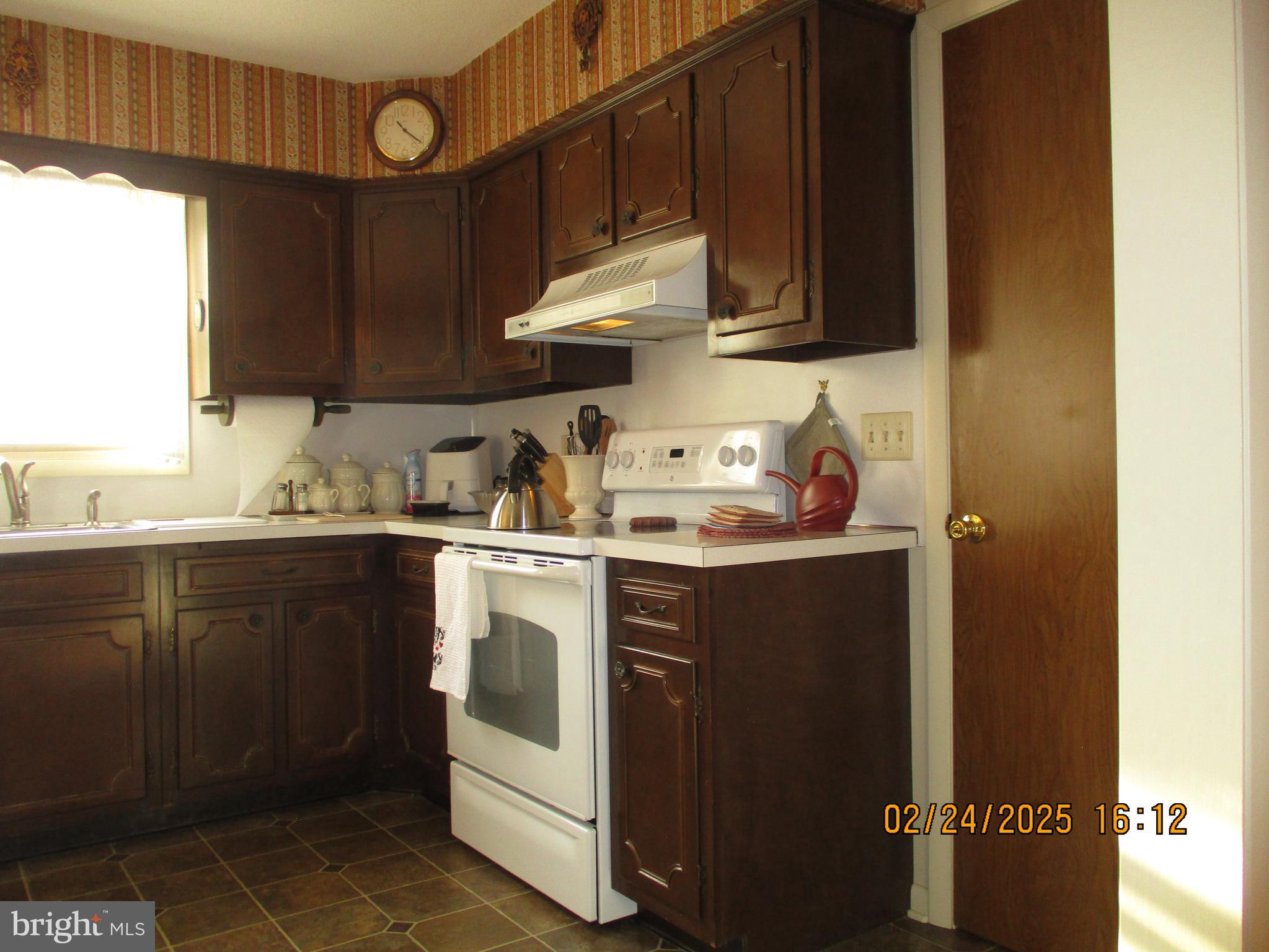 116 Lexington Road York, PA 17402 - Photo 19 of 69 a kitchen with a sink and cabinets
