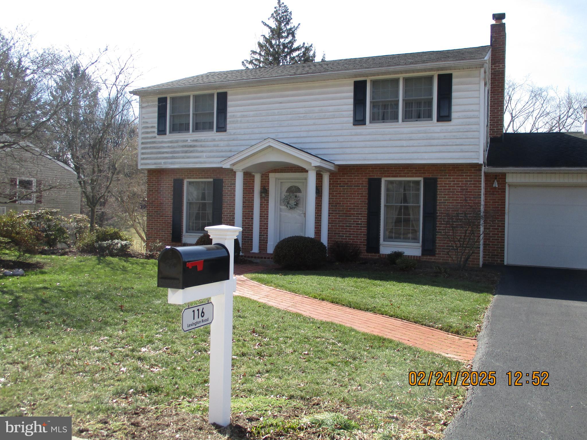 116 Lexington Road York, PA 17402 - Photo 2 of 69 a front view of a house with garden