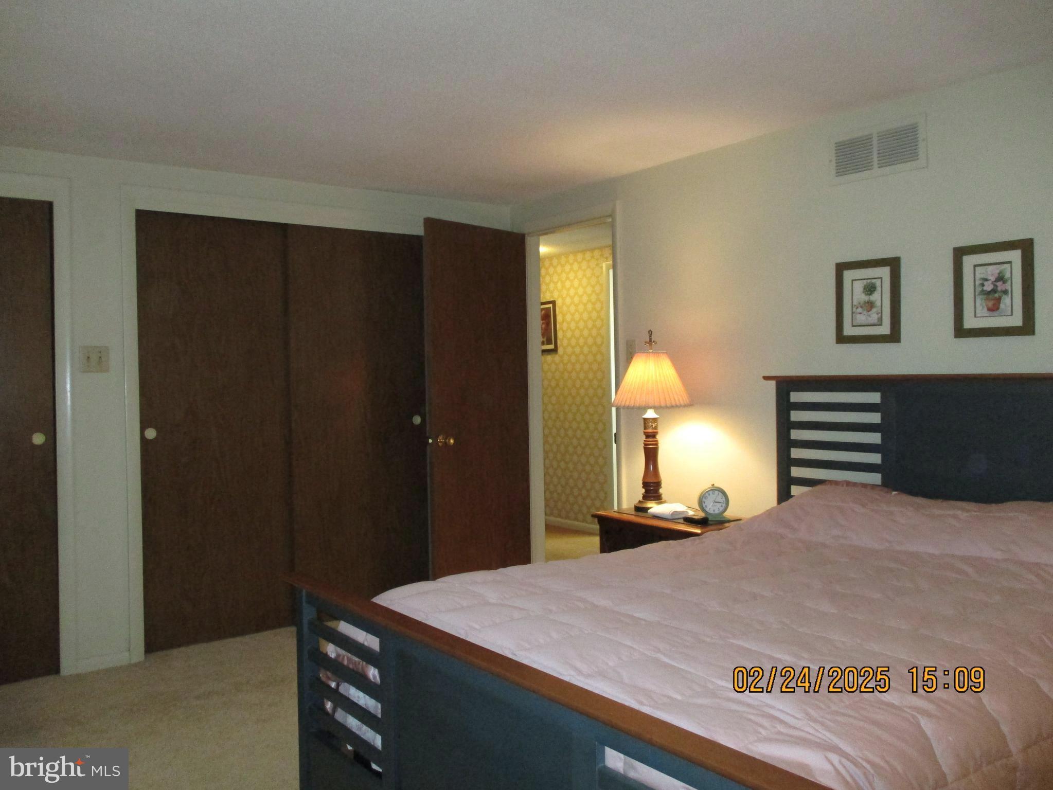 116 Lexington Road York, PA 17402 - Photo 24 of 69 a bedroom with a bed and a lamp