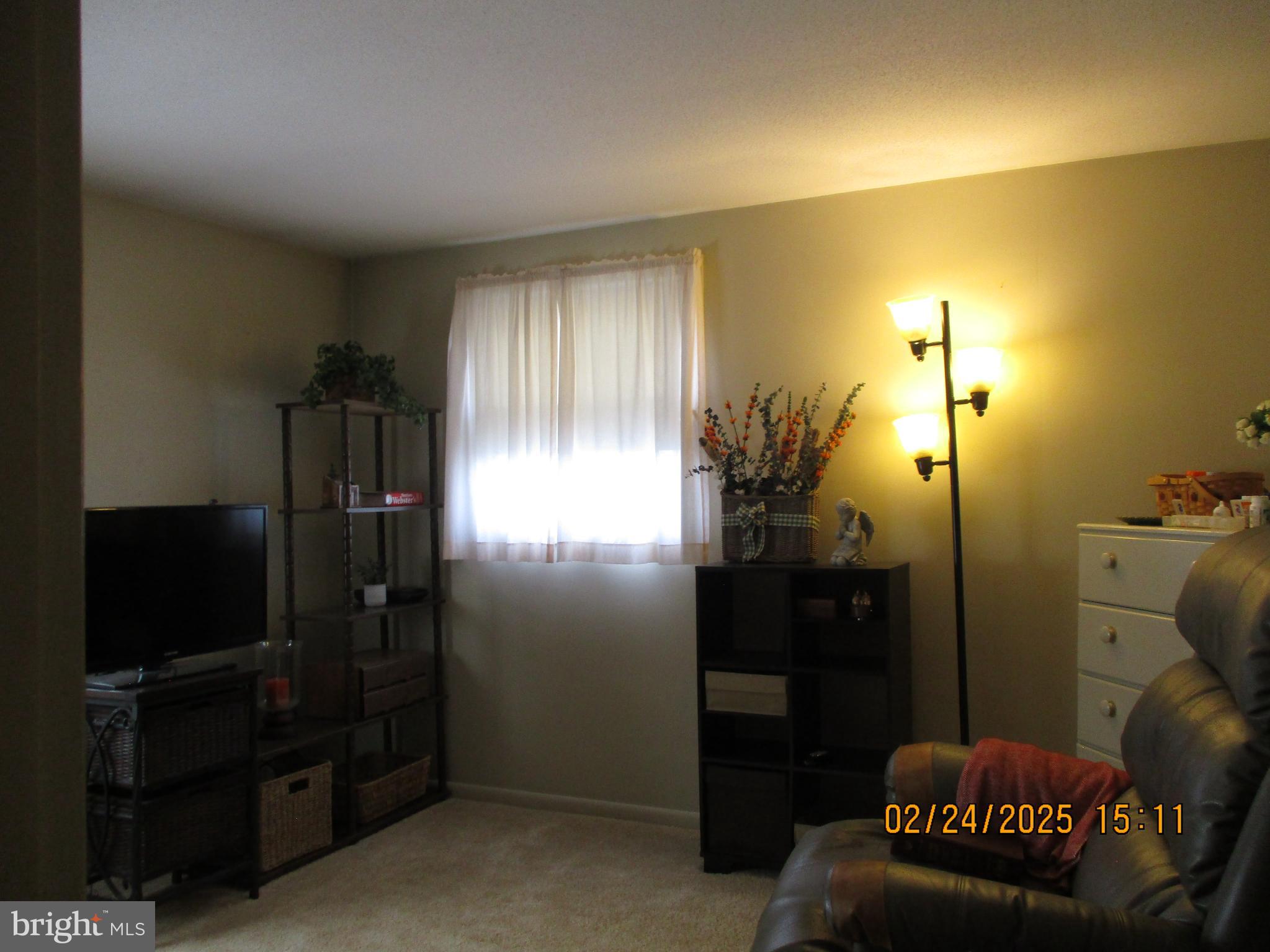 116 Lexington Road York, PA 17402 - Photo 25 of 69 a living room with furniture and a flat screen tv