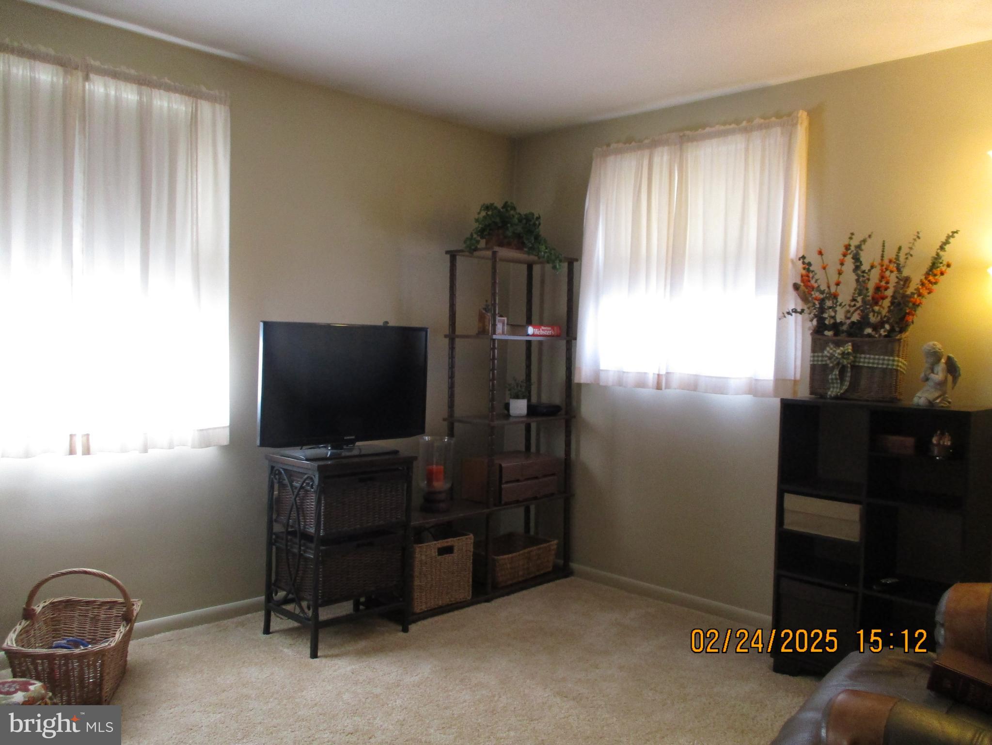 116 Lexington Road York, PA 17402 - Photo 27 of 69 a room with furniture and flat screen tv