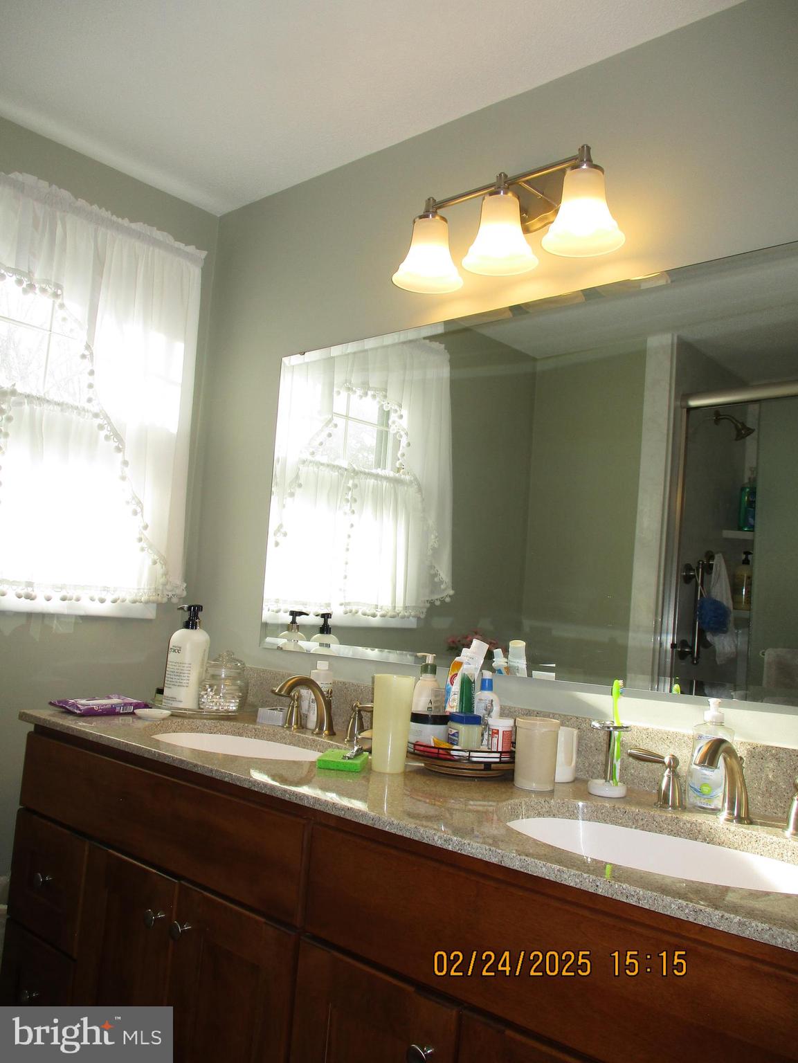 116 Lexington Road York, PA 17402 - Photo 31 of 69 a bathroom with a sink and a window