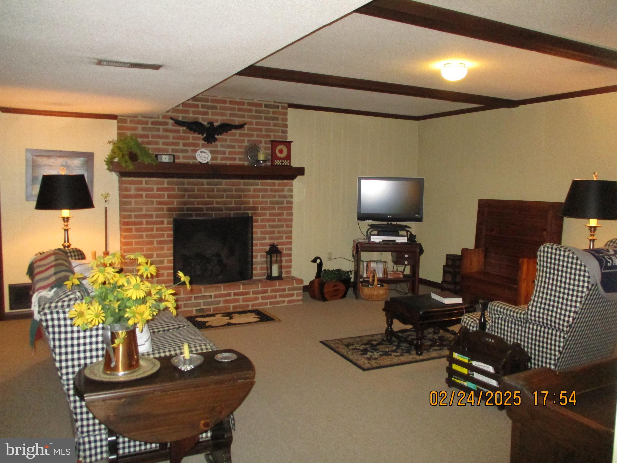 116 Lexington Road York, PA 17402 - Photo 42 of 69 a living room with furniture and a fireplace