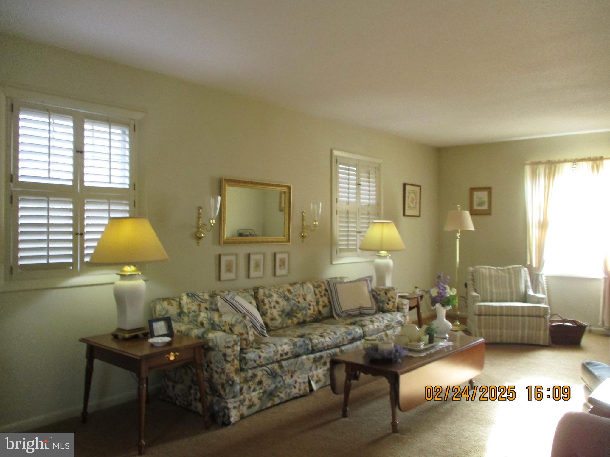116 Lexington Road York, PA 17402 - Photo 6 of 69 a living room with furniture and a lamp