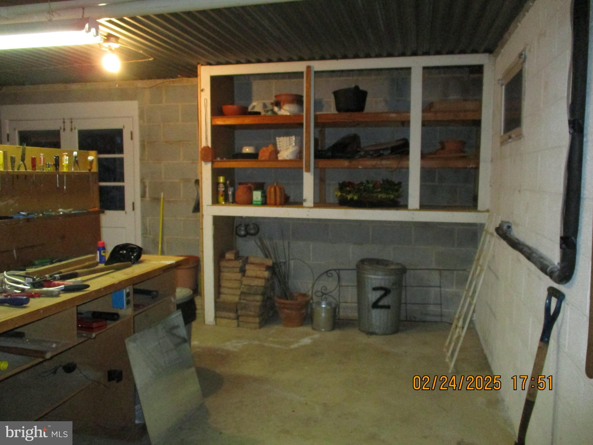116 Lexington Road York, PA 17402 - Photo 61 of 69 a room with furniture a bookshelf and a window