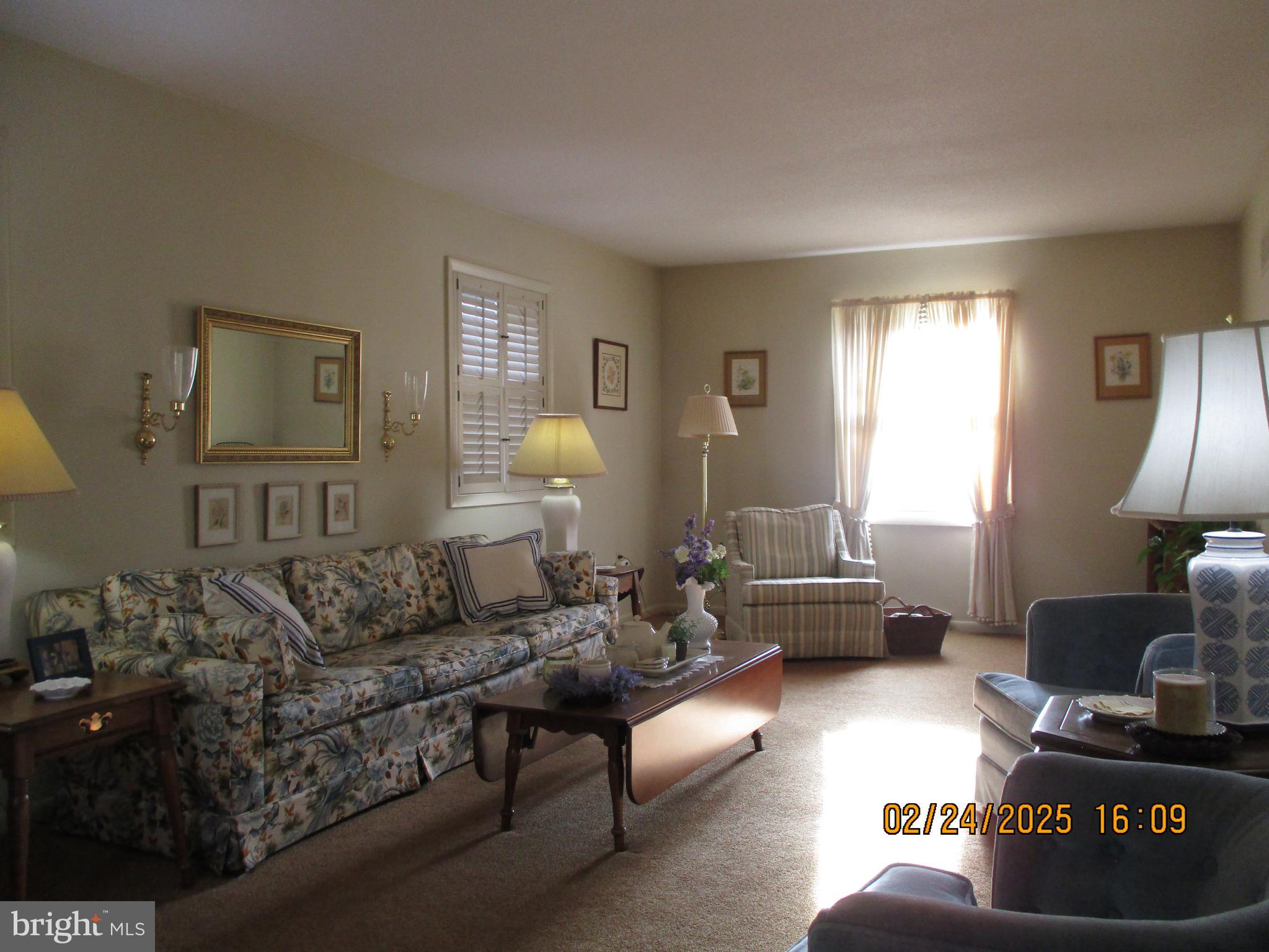116 Lexington Road York, PA 17402 - Photo 7 of 69 a living room with furniture and a fireplace