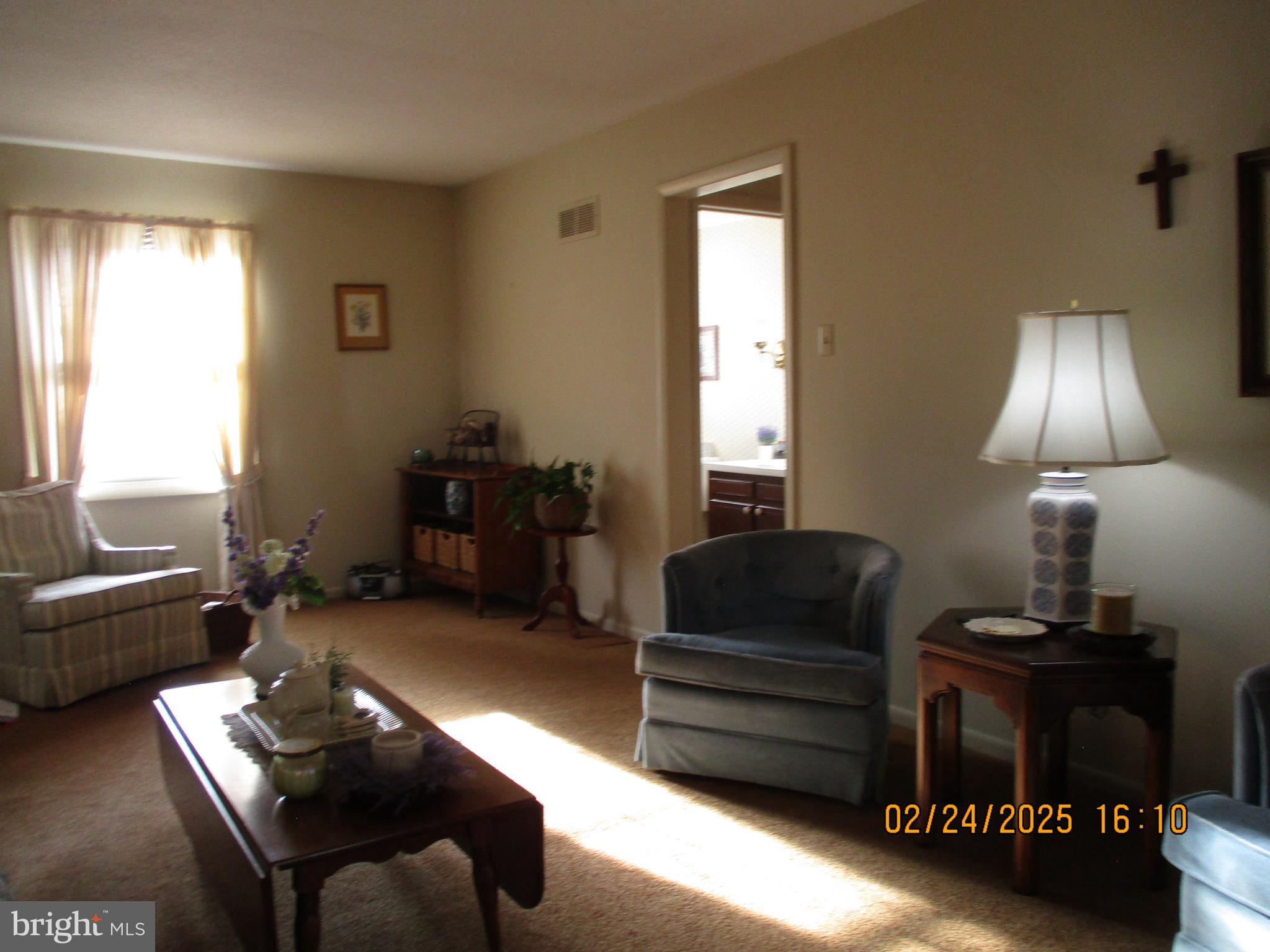 116 Lexington Road York, PA 17402 - Photo 8 of 69 a living room with furniture and a lamp