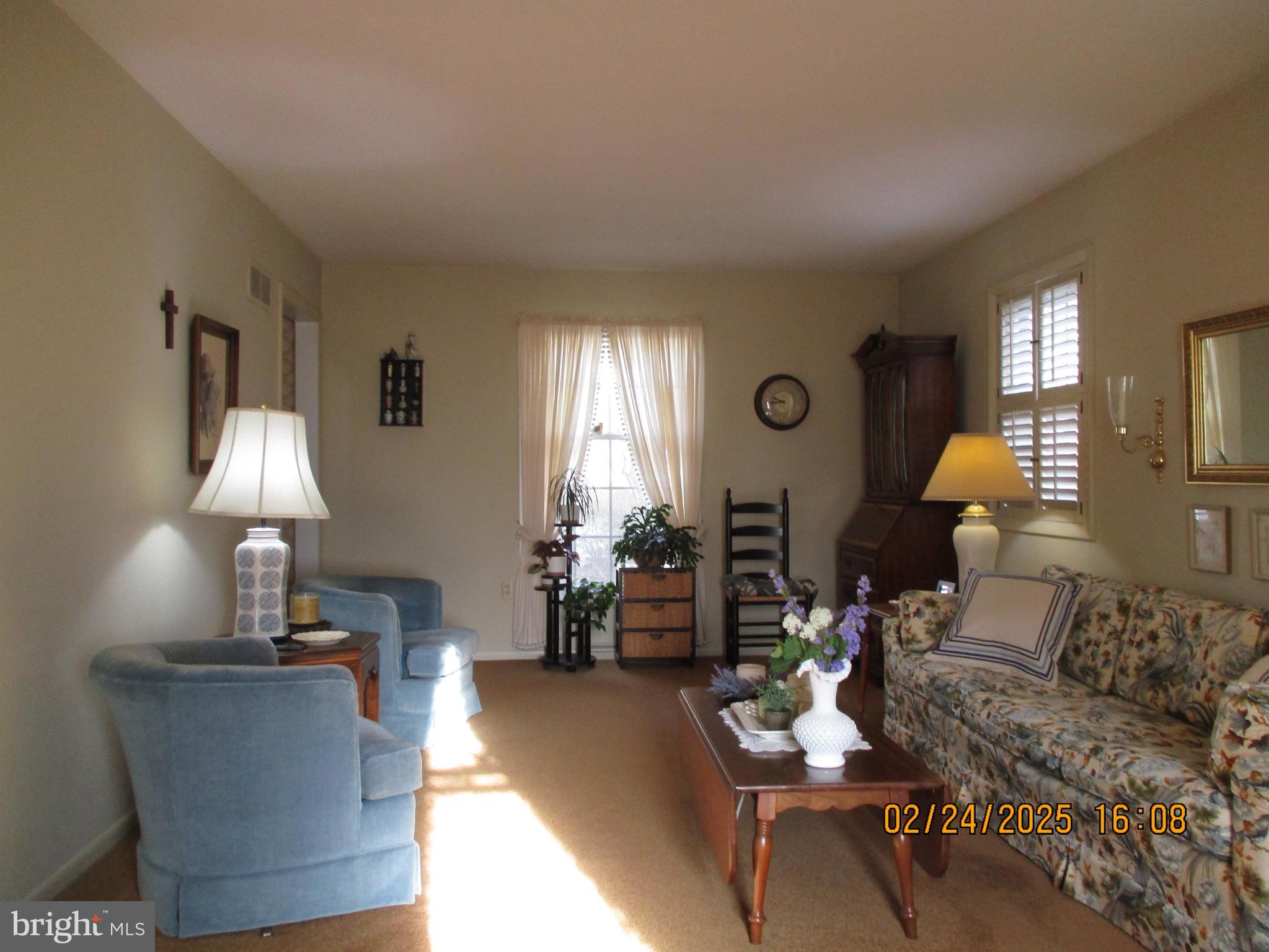 116 Lexington Road York, PA 17402 - Photo 9 of 69 a living room with furniture and a lamp