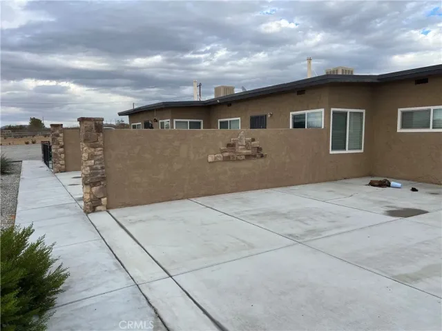 a front view of a house with yard